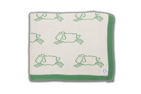 Cream blanket with green edging and green sheep pattern