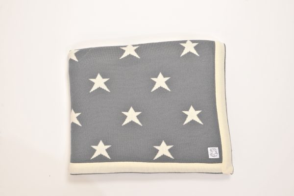 Grey blanket with cream edging and stars