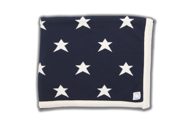 Navy blanket with cream edging and star pattern