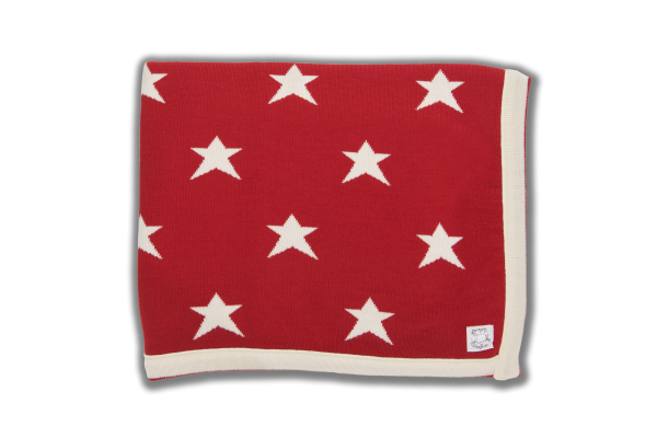 Red blanket with cream edging and star pattern