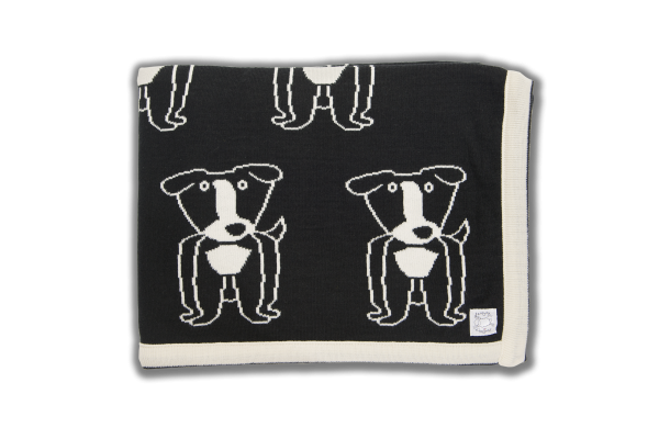 Black blanket with cream ending and cream dog pattern